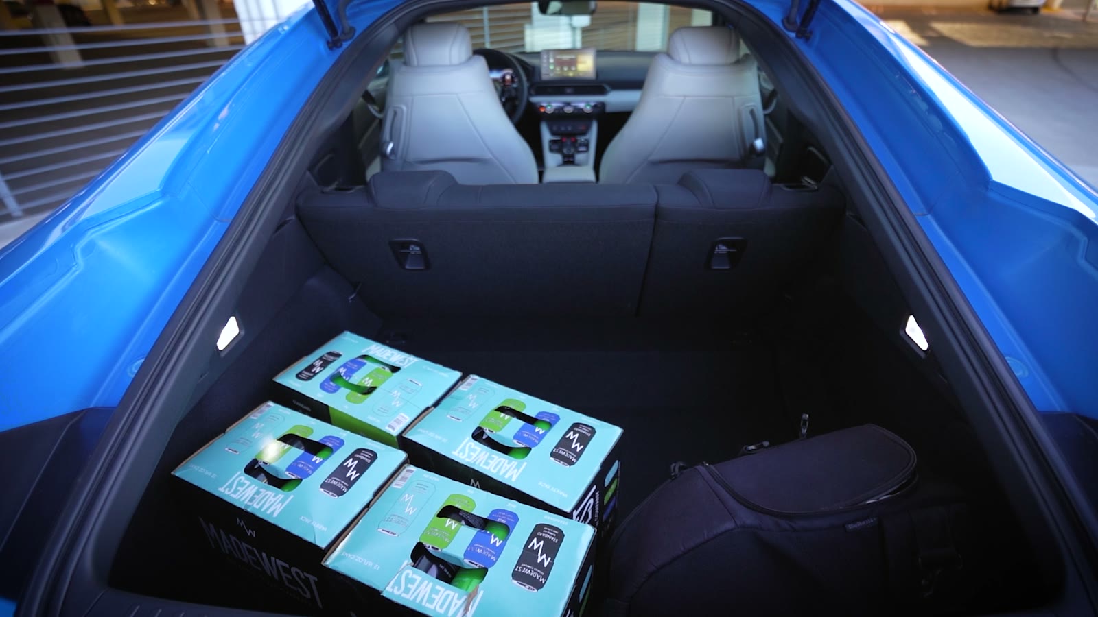 Four cases of beer in the trunk of a 2026 Honda Prelude